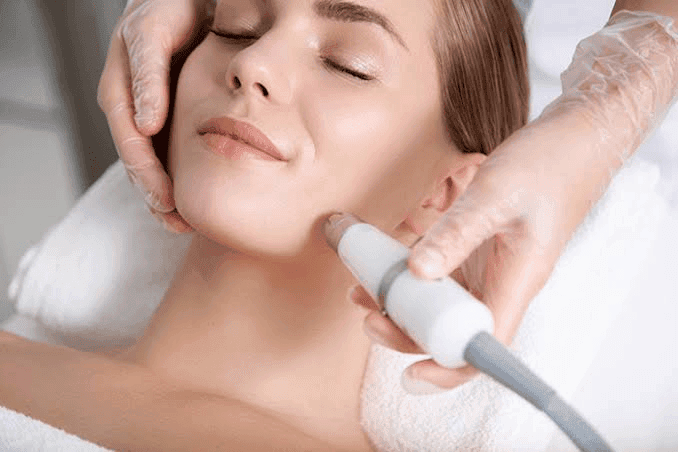 Person receiving facial treatment