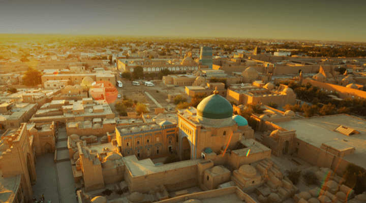 Aerial view of a city with a dome
